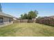 Expansive backyard with wooden fence, and a screened lanai at 3410 5Th W Dr, Palmetto, FL 34221