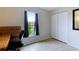 Bedroom featuring a window, a closet, and tile floors at 3410 5Th W Dr, Palmetto, FL 34221