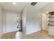 Bright foyer with tile flooring and a view of the front door, leading to the rest of the home at 3410 5Th W Dr, Palmetto, FL 34221