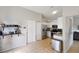 Well-lit kitchen features stainless steel appliances, tile floors, and bright white cabinetry at 3410 5Th W Dr, Palmetto, FL 34221