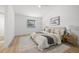 Serene bedroom with neutral decor, hardwood floors, and ample natural light at 4146 Brentwood Park Cir, Tampa, FL 33624