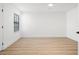 Spacious, bright bedroom with wood flooring, a ceiling fan, and a large window at 4146 Brentwood Park Cir, Tampa, FL 33624