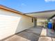 Spacious carport featuring concrete flooring, providing ample covered parking and outdoor space at 4532 W Idlewild Ave, Tampa, FL 33614