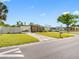 Well-maintained single-story home featuring a green lawn and inviting curb appeal at 4532 W Idlewild Ave, Tampa, FL 33614