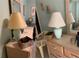 Bedroom features a dresser, lamp, and decorative accents, offering a cozy and inviting space for relaxation at 4558 Blossom Blvd # D, Zephyrhills, FL 33542