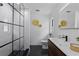 Contemporary bathroom showcasing a glass-enclosed shower, tile floor, and a modern vanity at 4715 Kemble Ct, Tampa, FL 33624
