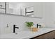Stylish bathroom featuring double sinks, contemporary faucets, and modern decor at 4715 Kemble Ct, Tampa, FL 33624
