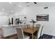 Bright dining area with a wooden table, upholstered chairs, and contemporary decor at 4715 Kemble Ct, Tampa, FL 33624