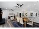 Open living space showcases modern decor, fireplace, dining area, and stylish flooring at 4715 Kemble Ct, Tampa, FL 33624