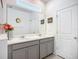 Bright bathroom with double vanity, modern fixtures, and ample counter space at 5415 Los Robles Ct, Palmetto, FL 34221