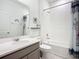 Clean bathroom featuring a shower-tub combo, neutral-toned cabinetry, and a vanity with counter space at 5415 Los Robles Ct, Palmetto, FL 34221