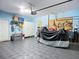 Well-organized garage with ample storage space, a pegboard, and epoxy flooring at 5415 Los Robles Ct, Palmetto, FL 34221