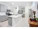 Spacious kitchen with a large island, stainless steel appliances, and modern fixtures at 5415 Los Robles Ct, Palmetto, FL 34221
