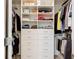 Organized walk-in closet with built-in shelves, drawers, and ample hanging space at 5415 Los Robles Ct, Palmetto, FL 34221