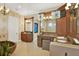 Elegant bathroom showcasing custom vanities, a soaking tub, and a glass-enclosed shower at 5630 Bayview Dr, Seminole, FL 33772