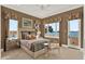 Bright bedroom featuring stylish decor, water views, and tasteful furnishings, offering a serene retreat at 5630 Bayview Dr, Seminole, FL 33772