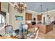 Inviting breakfast nook featuring water views, comfortable seating, and warm, natural light at 5630 Bayview Dr, Seminole, FL 33772