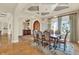 Beautiful dining room showcases an elegant chandelier, arched entryways, and stylish furnishings at 5630 Bayview Dr, Seminole, FL 33772