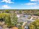 Aerial view of a residential neighborhood, showcasing the home's location, landscaping and surrounding area at 7824 Blackstone Dr, Port Richey, FL 34668