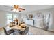 Well decorated dining room features decorative furniture, chandelier, and access to the backyard at 7824 Blackstone Dr, Port Richey, FL 34668