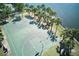 Aerial view of the community's basketball court, providing a scenic spot for recreation by the lake at 9736 Sage Creek Dr, Ruskin, FL 33573