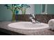 Bathroom sink with chrome faucet, granite countertop and decorative flower arrangement at 9736 Sage Creek Dr, Ruskin, FL 33573