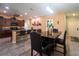 Expansive open concept kitchen, dining, and living space with tile flooring at 9736 Sage Creek Dr, Ruskin, FL 33573