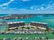 Condo complex on a waterfront community with boat docks and panoramic ocean views at 1 Key Capri # 301E, Treasure Island, FL 33706