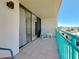 Balcony with seating and lovely view at 1 Key Capri # 301E, Treasure Island, FL 33706