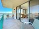 Inviting balcony offering stunning waterfront views and comfortable seating at 1 Key Capri # 301E, Treasure Island, FL 33706