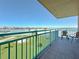 Enjoy a relaxing outdoor space with a balcony view overlooking the recreational areas at 1 Key Capri # 301E, Treasure Island, FL 33706