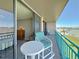 Relaxing balcony with seating overlooking water and city at 1 Key Capri # 301E, Treasure Island, FL 33706