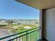 Balcony view of recreational areas and waterfront at 1 Key Capri # 301E, Treasure Island, FL 33706
