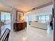 Bright living space with sliding glass doors opening to water views at 1 Key Capri # 301E, Treasure Island, FL 33706