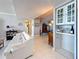 Cozy living area featuring sleek tile floors, and modern furnishings at 1 Key Capri # 301E, Treasure Island, FL 33706