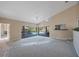 Expansive living area with high ceilings, glass doors leading to the pool, perfect for entertaining and relaxation at 1006 Chatham Ct, Safety Harbor, FL 34695