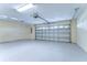 Spacious garage with ample room and a closed door at 10144 Arbor Run Dr # 122, Tampa, FL 33647