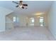 Expansive living area boasting neutral tones and seamless transitions to other living spaces at 10144 Arbor Run Dr # 122, Tampa, FL 33647
