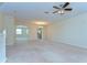 Bright and spacious living room features an open floor plan and abundant natural light at 10144 Arbor Run Dr # 122, Tampa, FL 33647