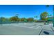 View of Tennis Courts featuring shaded seating and mature landscaping at 10144 Arbor Run Dr # 122, Tampa, FL 33647