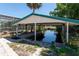 Dock and boat lift for easy water access and boat storage at 112 Gause Dr, Venice, FL 34293