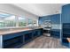 Kitchen with butcher block counters, stainless appliances, tile backsplash and wood-look floors at 112 Gause Dr, Venice, FL 34293