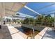 Enclosed pool area with a pool surrounded by ample space for patio furniture at 112 Gause Dr, Venice, FL 34293