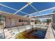 Enclosed pool area featuring a pool adjacent to the house at 112 Gause Dr, Venice, FL 34293