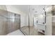 Bathroom featuring a tiled shower, neutral color scheme, and double sink vanity at 11416 Carlton Fields Dr, Riverview, FL 33579