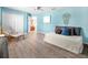 Bright bedroom with natural light, hardwood floors, and neutral color scheme at 11416 Carlton Fields Dr, Riverview, FL 33579