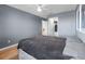 Serene bedroom with hardwood flooring, and closet for optimal storage at 11416 Carlton Fields Dr, Riverview, FL 33579