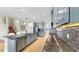 Stylish kitchen with blue cabinets, granite countertops, stainless steel appliances, and a functional center island at 11416 Carlton Fields Dr, Riverview, FL 33579