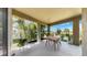Inviting outdoor patio featuring elegant landscaping and views of the surrounding greenery at 11416 Carlton Fields Dr, Riverview, FL 33579