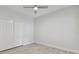 Spacious bedroom with a ceiling fan and closet at 12408 Palatka Dr, Venice, FL 34293